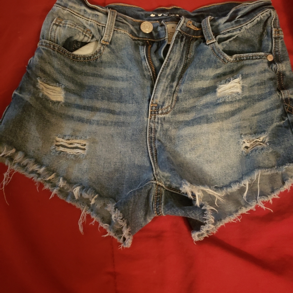 Distressed denim shorts